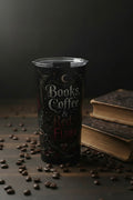A tall black insulated tumbler with a clear lid, featuring the phrase 'Books Coffee & Red Flags' in decorative white and red lettering on a white background.